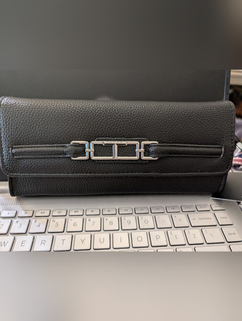Black Leather Continental Wallet with Silver Hardware